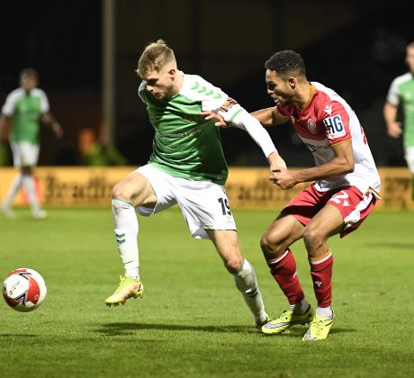 Charlie Wakefield holds off his marker